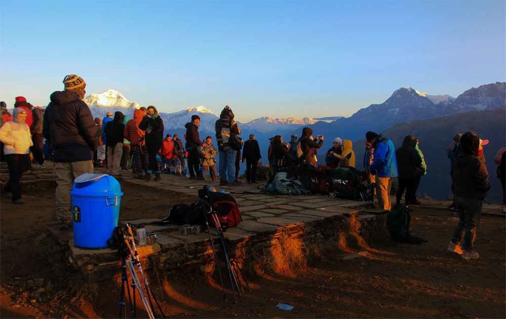 dhaulagiri mountain view and trekkers on the poon hill during the best nepal tour