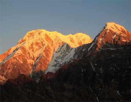 sunrising color on annapurna south and himchuli on 3-day short mardi himal trek.